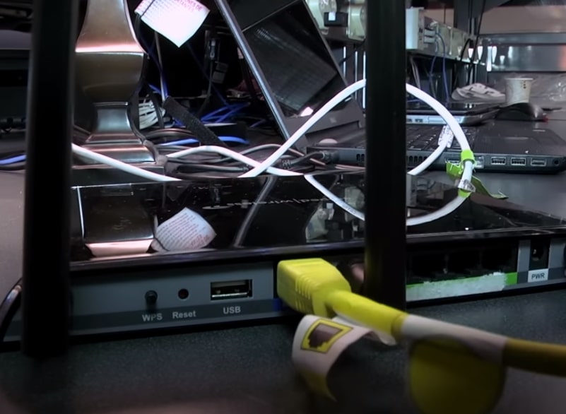 Close-up of a wireless router sitting on top of a table